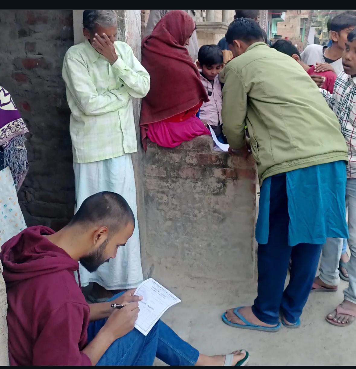 ASWF youth conducting community survey